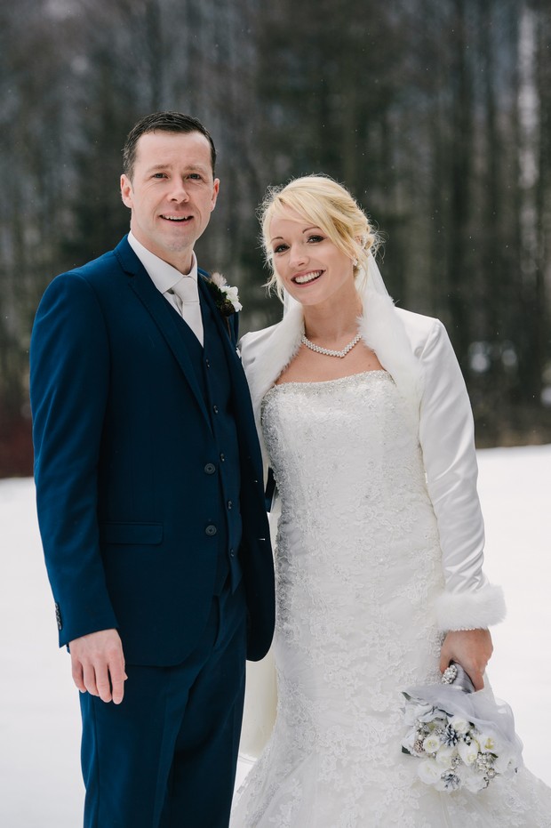 bride groom in snow winter wedding