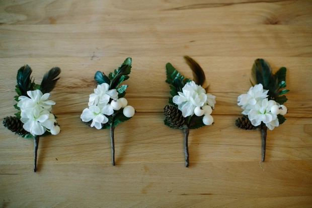 snow berry winter wedding boutonniere button holes