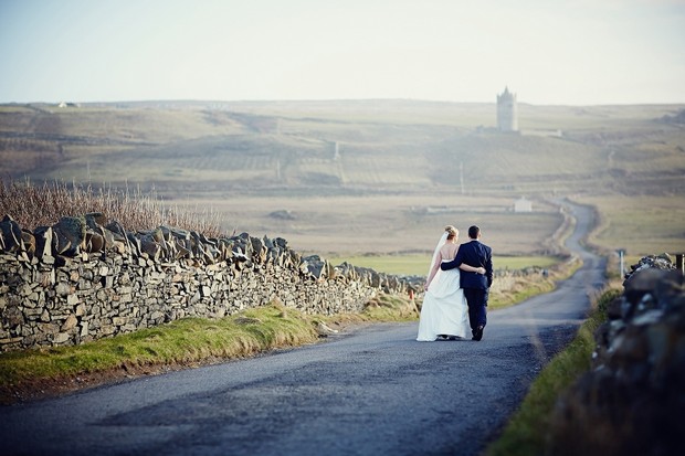 bride-groom-walking-road-ireland-wedding