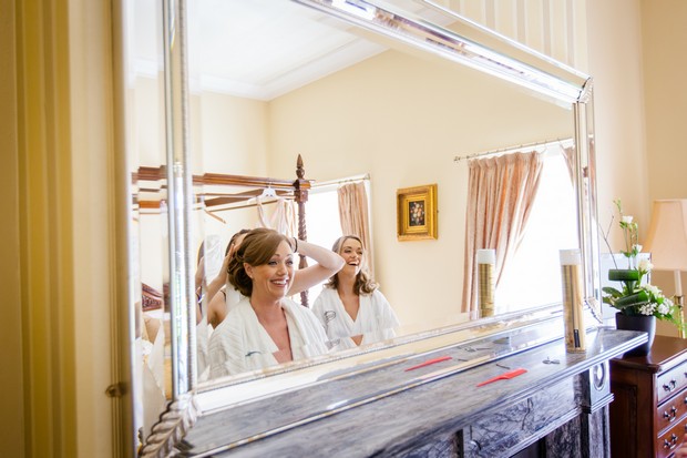 bride looking in mirror