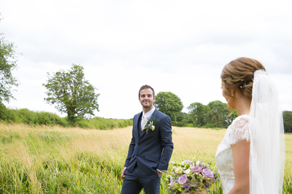 bride groom in meadow