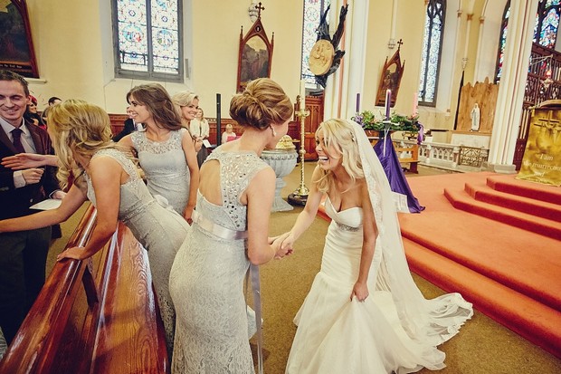 34-bridesmaids-bride-greeting-church-wedding