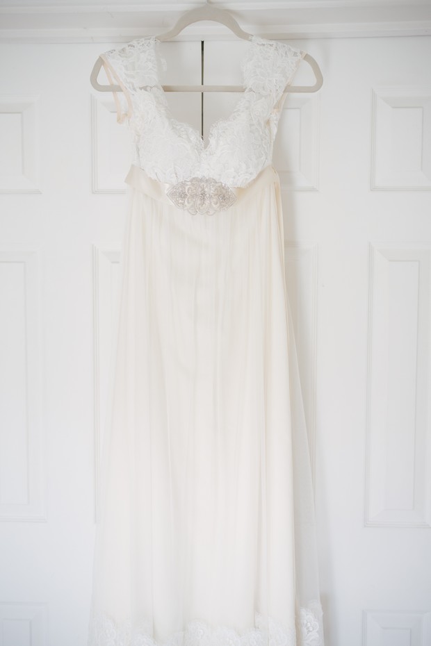 Claire Pettibone Lace Wedding Dress on Hanger