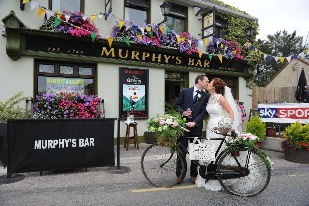 bride_groom_outside_irish_pub_vintage_bicycle