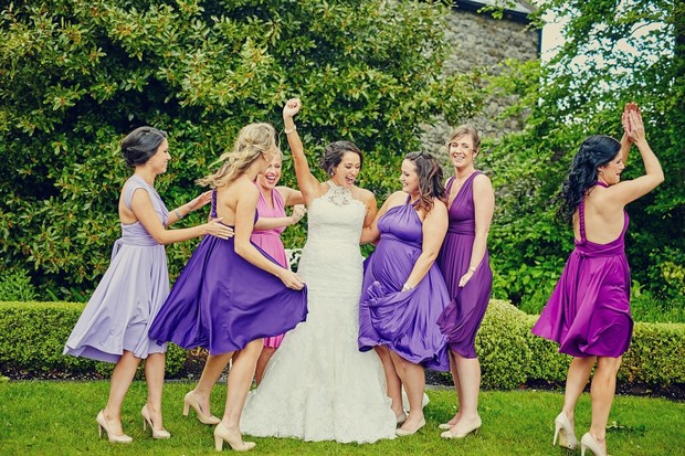 fun-bridesmaids-purple-dancing-mis-matched