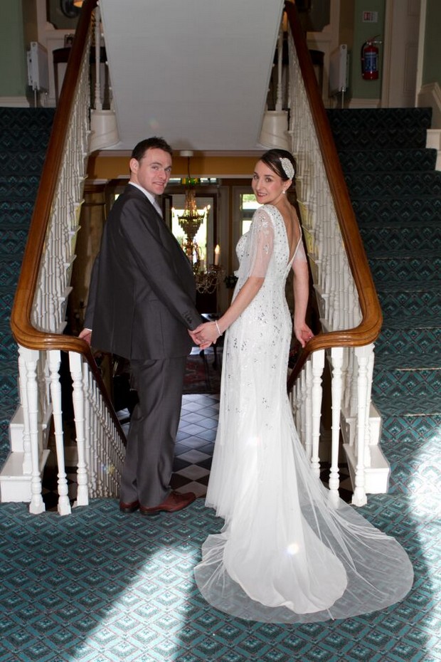 bride-and-groom-at-top-of-stairs-ballyseede-castle-kerry