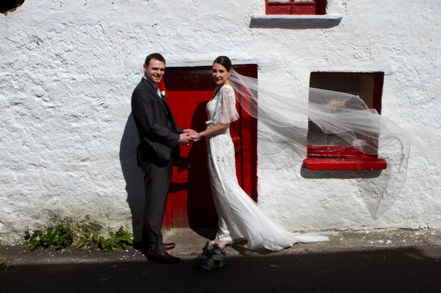 bride-and-groom-outside-old-cottage-kerry