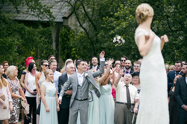 groom-catching-bouquet-toss-funny-photos