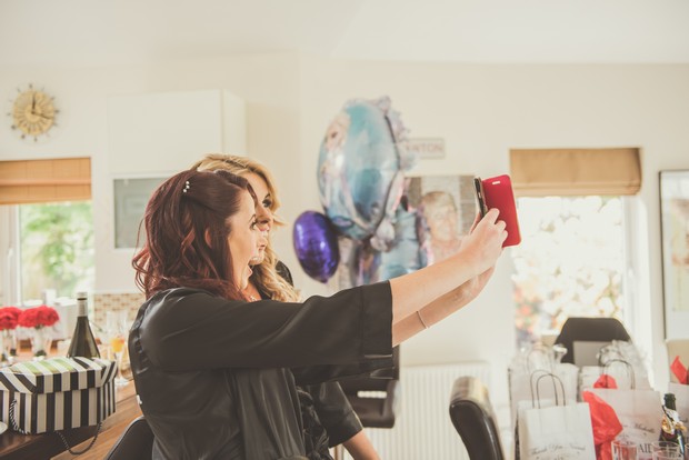 10-Bridesmaids-Taking-Selfie-Getting-Ready-Wedding-Photos-weddingsonline