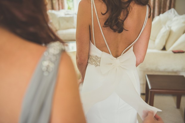 17-Low-Back-Wedding-Dress-Spaghetti-Straps-weddingsonline