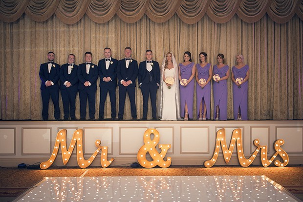 bridal-party-with-giant-mr-and-mrs-sign