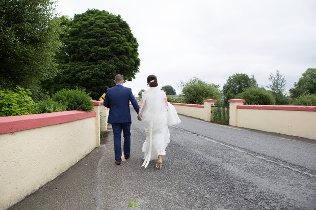 hamlet-court-hotel-real-wedding-bride-and-groom-walking-down-road