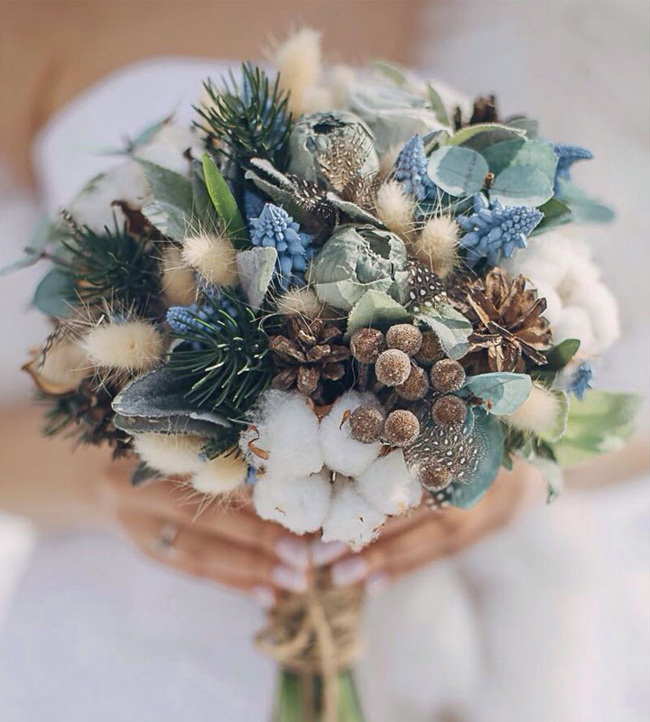 Winter-Wedding-Bouquet-Blue-Thistle-Pinecone-weddingsonline