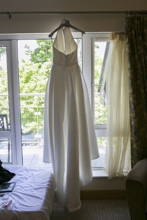 wedding-dress-hanging-from-window