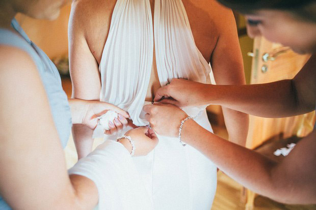 bride-getting-dressed