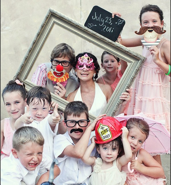 Cray kids at wedding with bride and groom